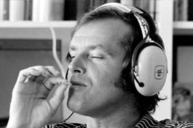 Jack Nicholson smoking a joint and listening to music with headphone - Magic Leaf Tees